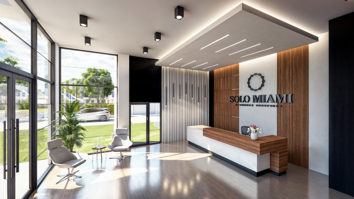 Lobby lounge with full-height glazing, ceiling light coves and a suspended canopy over reception.